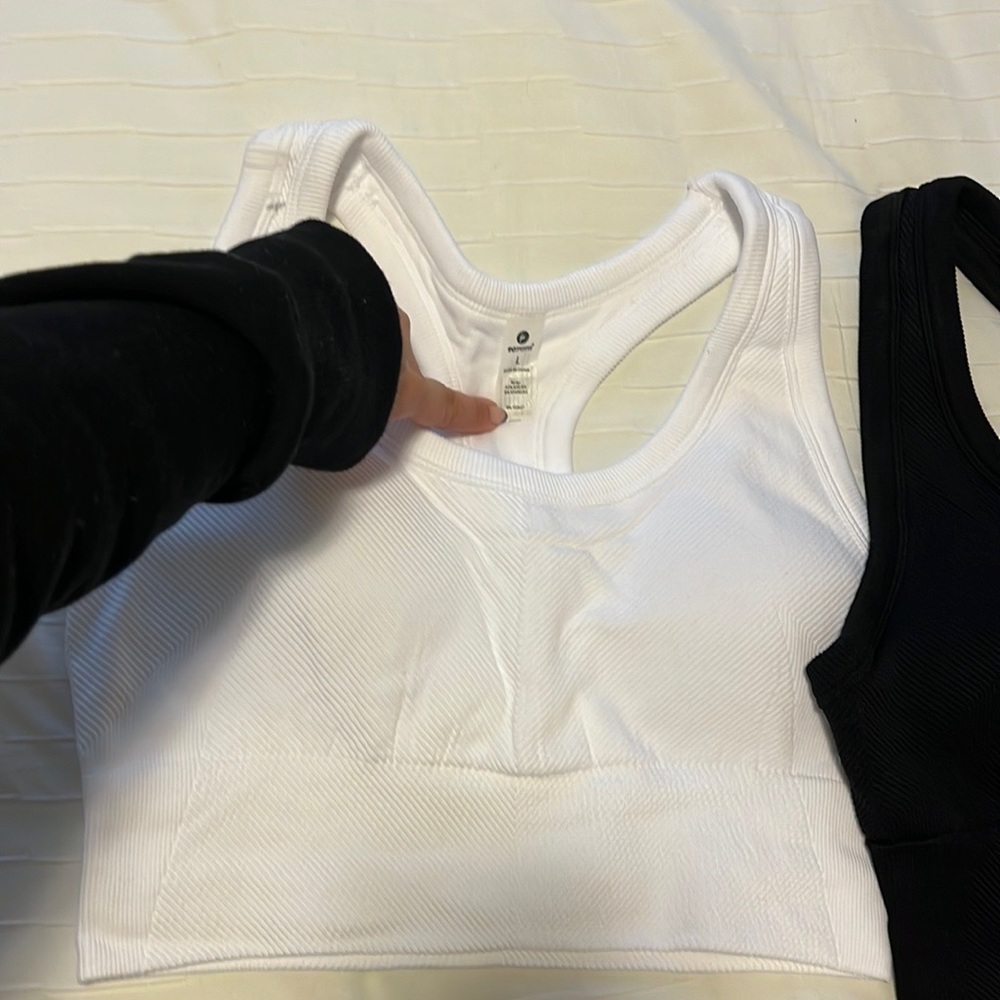 NEW with out tags, black & white sports bra set size large